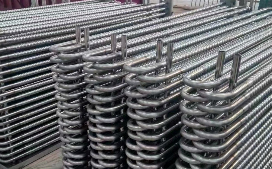 Industrial boiler tubes specifically used in sugar production, emphasizing their capability to withstand high temperatures and pressures in sugar processing plants